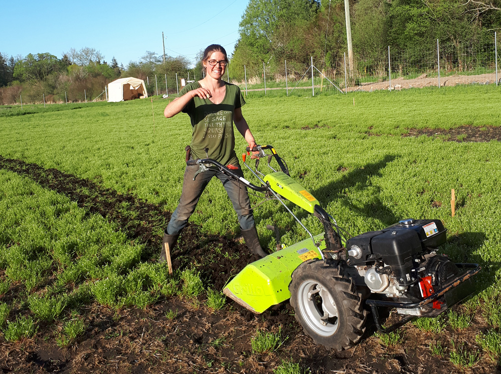 Ariella Falkowski with her walk-behind tractor