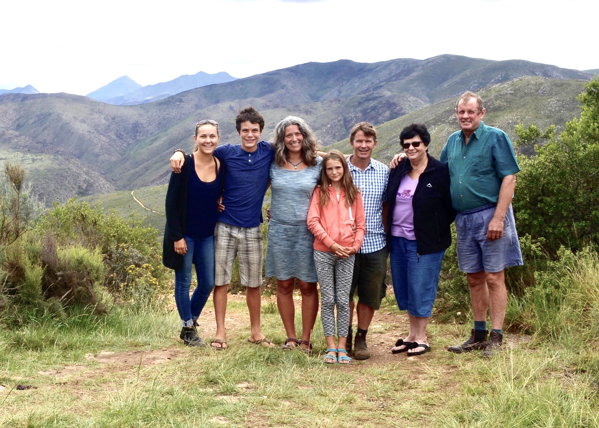 Harvey family with Wild Mountain Honeybush farmers in South Africa