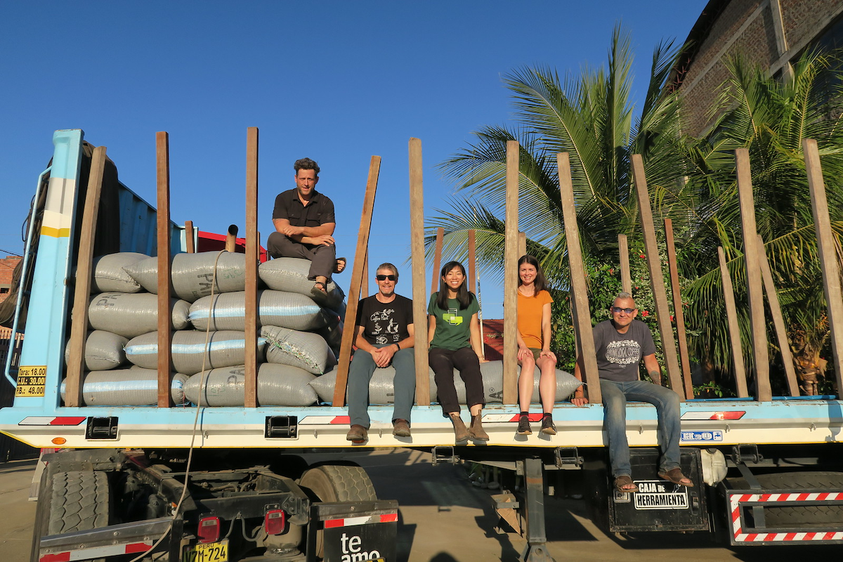 Level Ground staff help load coffee headed from the co-op to export in Peru. Credit: Level Ground Coffee Roasters.